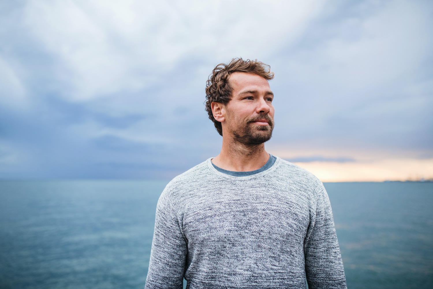 man standing at the beach