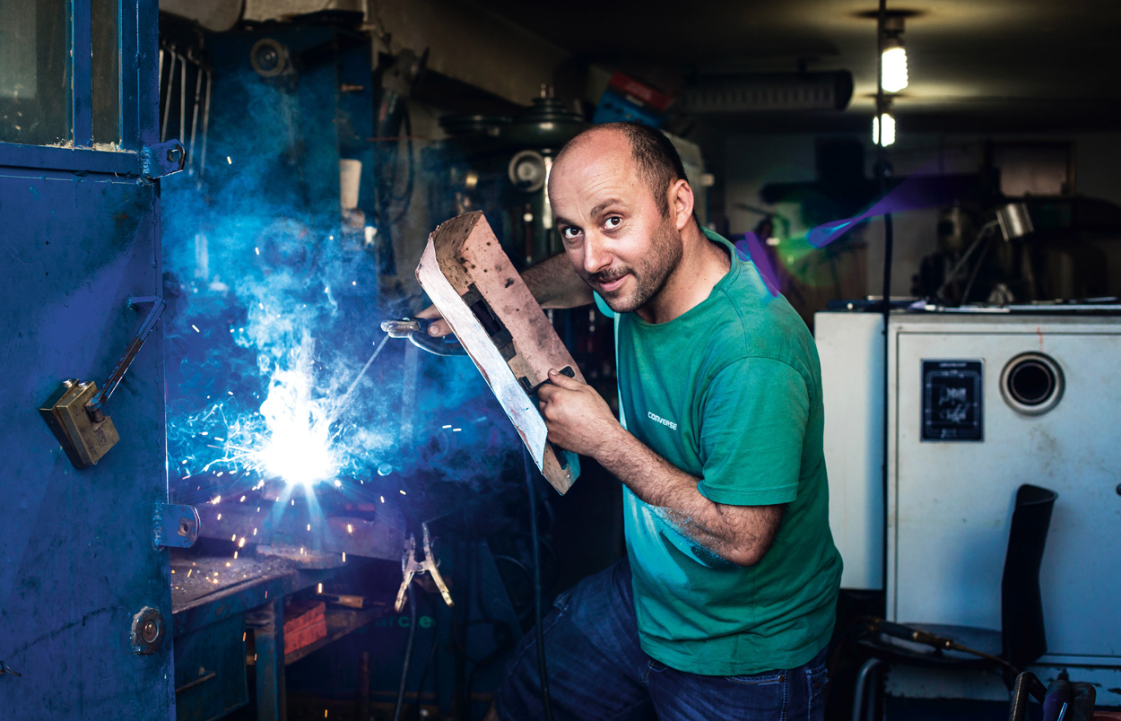 man welding at work